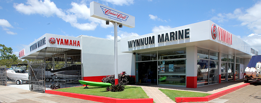 external of wynnum marine store with brands and boats on display