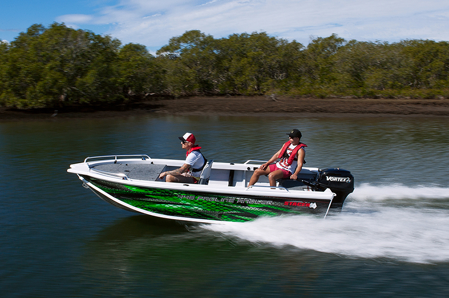 Two fishemen in the stacer 449 proline angler motor up the river